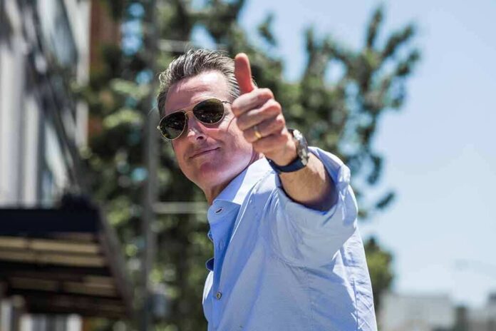 shutterstock_1677676429 man in sunglasses giving a thumbs-up outdoors