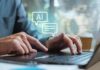 U.S. Terror Tag Hits Italian Coders Hands typing on a laptop with AI chat icons