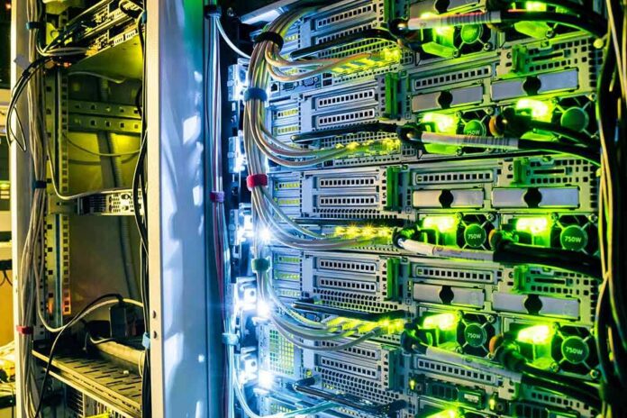 shutterstock_764666944 Server rack with network cables and glowing indicator lights