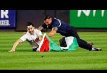 Flag Dash Erupts at Yankee Stadium Man stormed yankee stadium at 9:11 pm with palestinian flag