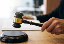 Gala Meltdown: $1M Bill Goes Missing Judge's hand holding a gavel over a sound block