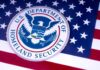 U.S. Department of Homeland Security seal on American flag