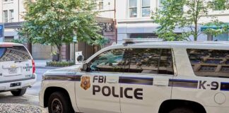 FBI police K-9 SUV parked on a city street