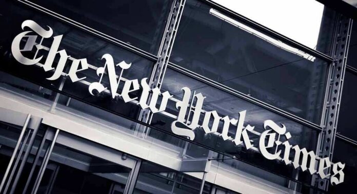shutterstock_1239948853-1 The New York Times sign on a glass building facade