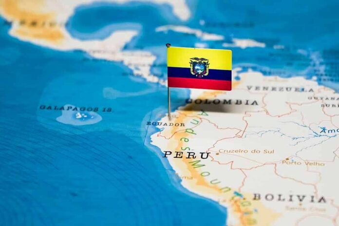 Ecuador flag pin on a map of South America