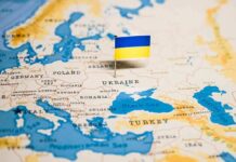 Zelensky Slammed As Pumps Run Dry Ukraine flag pin on a map of Eastern Europe