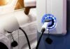 Electric vehicle charging at wall-mounted EV charger