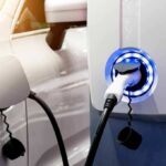 Trump Finalizes Major Fuel Economy Rollback Electric vehicle charging at wall-mounted EV charger