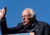Nuclear-Level Penalties For Building AGI Bernie Sanders speaking at a podium outdoors