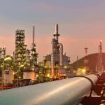 Trump’s Energy Truce Faces New Test Oil refinery with pipelines at sunset