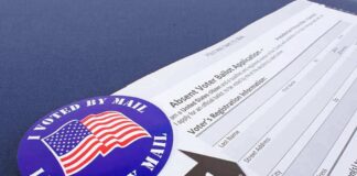 I Voted by Mail sticker on absentee ballot application form