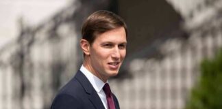 Jared Kushner in a navy suit outdoors