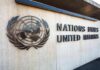 United Nations emblem and signage on a concrete wall