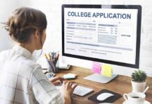 Med School Rocked By DOJ Findings Student completing a college application on a desktop computer