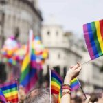 Prayer Showdown Erupts at Cathedral Pride flags waved at a city parade