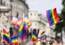 Prayer Showdown Erupts at Cathedral Pride flags waved at a city parade