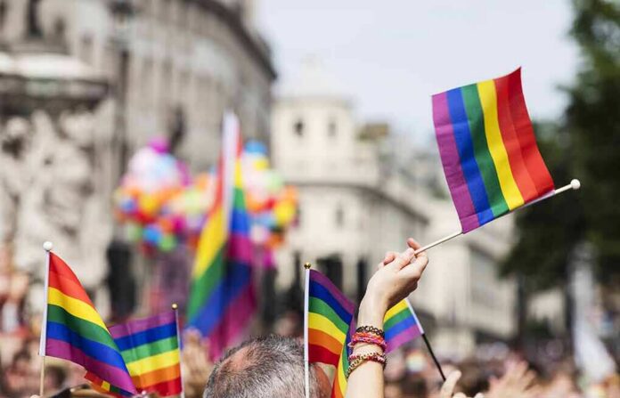 shutterstock_674538397 Pride flags waved at a city parade