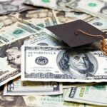 Governors Hold Scholarships Hostage Graduation cap on a pile of US dollar bills
