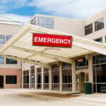 Badge Swipe Breakout Baffles Feds Emergency room entrance at a modern hospital