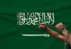 Missiles Rock Riyadh – Flights Paralyzed Hands breaking chains over a green flag with Arabic script and a sword