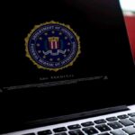 Unseen Chats Shadow Butler Attack Laptop screen displaying FBI seal