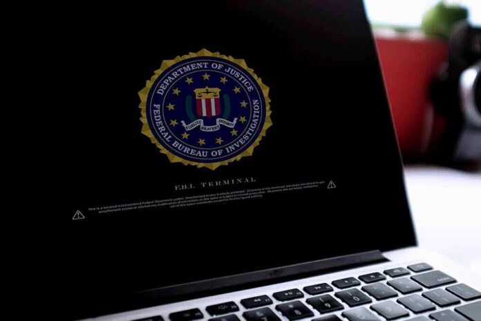 shutterstock_1562734477 Laptop screen displaying FBI seal