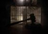 Execution Fails – Panic In Death Row Judge’s gavel in silhouette before prison bars