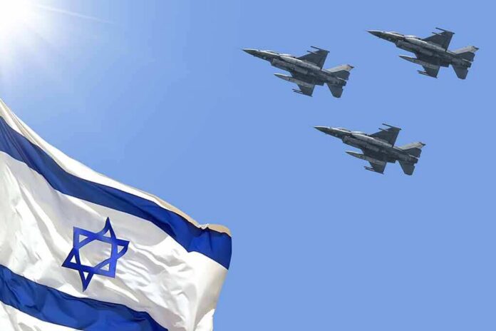 shutterstock_1965607009 Israeli flag with three fighter jets flying overhead