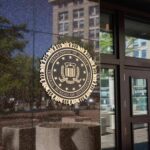 DOJ Drops Bomb on Ex-FBI Leaders FBI seal on a building entrance