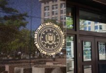 DOJ Drops Bomb on Ex-FBI Leaders FBI seal on a building entrance