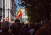 Crowd with Spanish flags in a city street