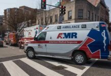 Expressway Plane Crash Sparks Panic Ambulance and fire trucks at an urban intersection